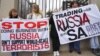 SOUTH AFRICA – Ukrainian Association members protest outside the hotel in Johannesburg, South Africa, Wednesday, July 20, 2022, as Russian international business mission in SA kicks off inside the Holiday Inn Hotel in Sandton.