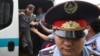 Kazakhstan - Police officers detain an opposition supporter during a protest against presidential election results, in Almaty, Kazakhstan, June 10, 2019. REUTERS/Pavel Mikheyev