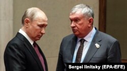 Президент Росії Володимир Путін і очільник «Роснефти» Ігор Сєчин, 2019 рік