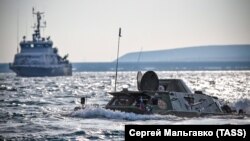 RUSSIA - One of the two BRDM-2 amphibious armoured cars prepares to re-enact crossing the Kerch Strait from mainland Russia's Taman to Crimea's Kerch